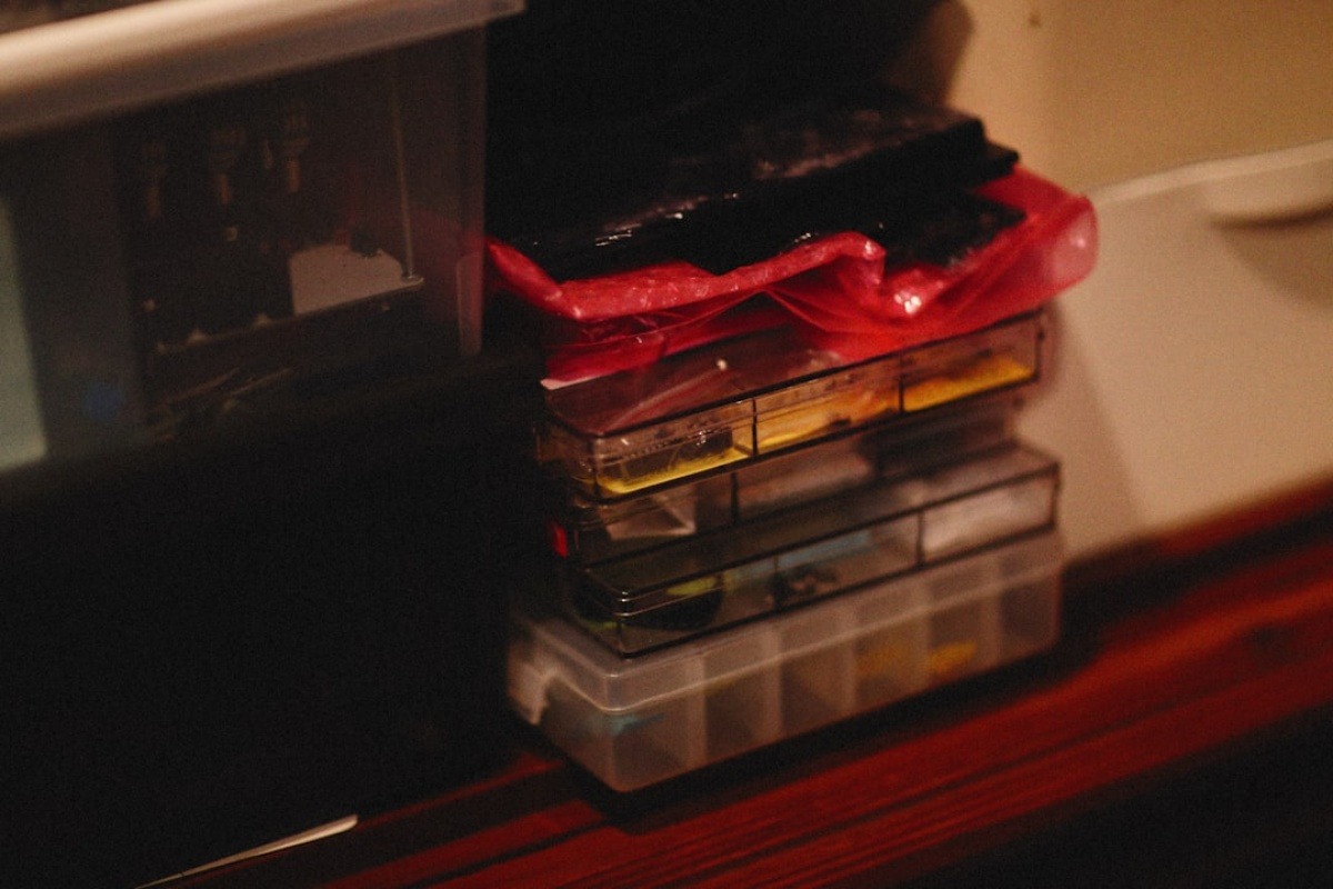 stacking storage bins in a clean organized workspace